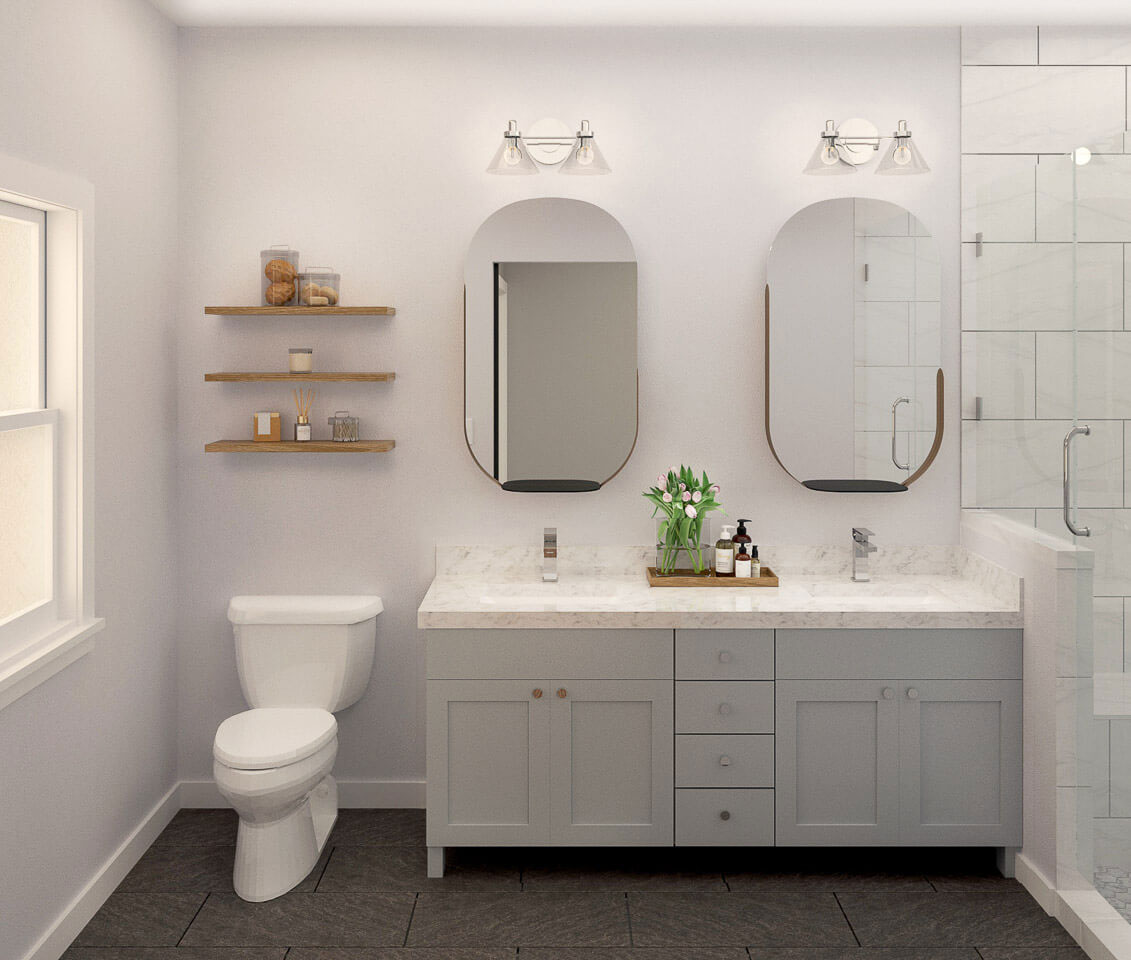 A modern bathroom with a double sink vanity, toilet, and shower.